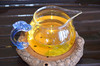 2012年春早普洱茶，选用当年云南版纳茶区大树春茶为原料，遵循传统大叶种晒青  茶工艺制作而成。饼型饱满、条索清晰完整，茶汤成金黄色通透明亮。汤水细腻，香甜韵足，回甘持久  。优选的原料加上传统工艺， 商品缩略图3