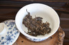 2012年春早普洱茶，选用当年云南版纳茶区大树春茶为原料，遵循传统大叶种晒青  茶工艺制作而成。饼型饱满、条索清晰完整，茶汤成金黄色通透明亮。汤水细腻，香甜韵足，回甘持久  。优选的原料加上传统工艺， 商品缩略图2