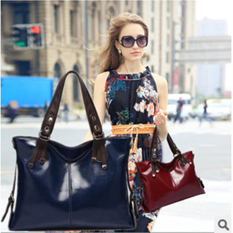 【服饰鞋包】时尚油蜡皮女士手提包 单肩斜挎机车包包 商品图0