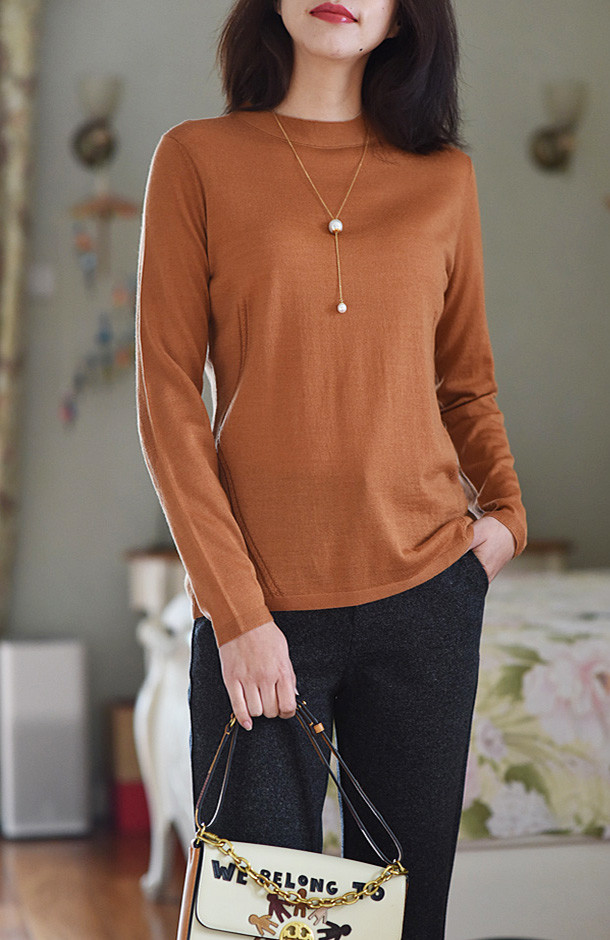 zv圆立领羊毛镂空休闲毛衫