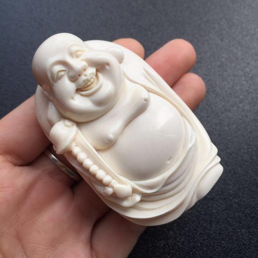 45635猛犸象牙如意笑佛手把件