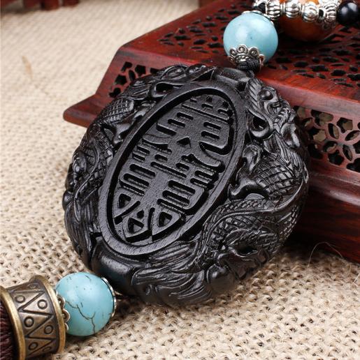 【汽车用品】镇店之宝 汽车乌木挂件 出入平安立体雕刻汽车装饰用品 AWS018 商品图2