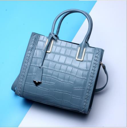 【服饰鞋包】。头层牛皮女士手提包简约时尚 单肩斜挎包 商品图2