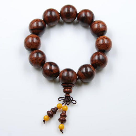 文玩海黄手串极品鬼脸