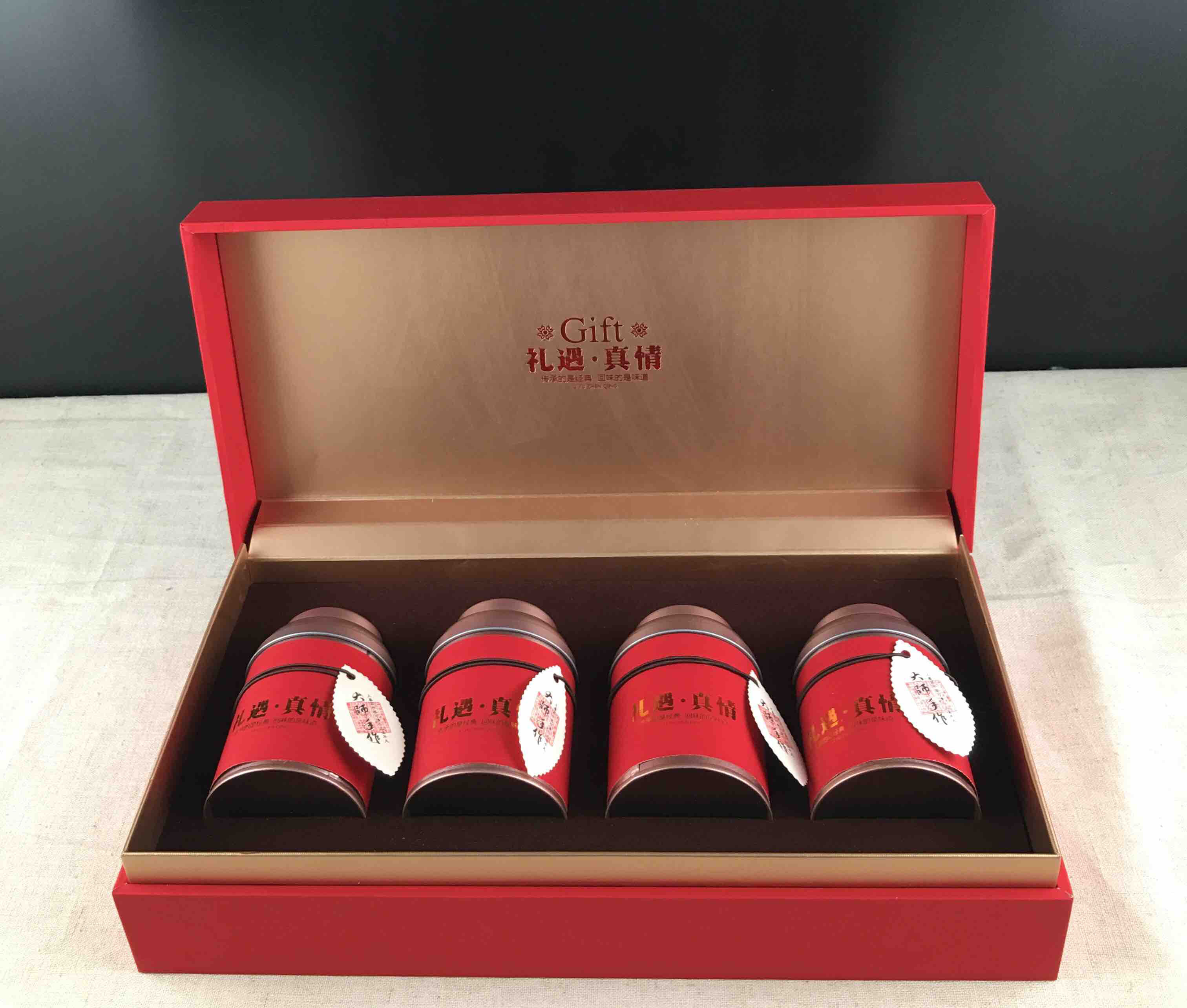 包邮现价一套31元,一箱20套 ,一箱620元,礼遇真情四罐茶叶礼盒容量缮