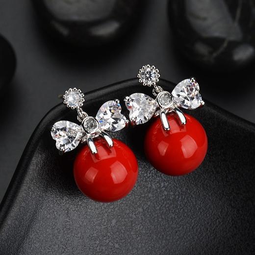 QX-韩国风蝴蝶结红珍珠镶嵌锆石耳钉TZW 商品图1