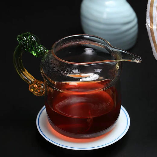 234     老樟香●微信促销，2010年宫廷樟香散茶，近年压制，樟香明显，回甘明显，56一片,买7送1！！！，仅限今天哦！ 商品图3