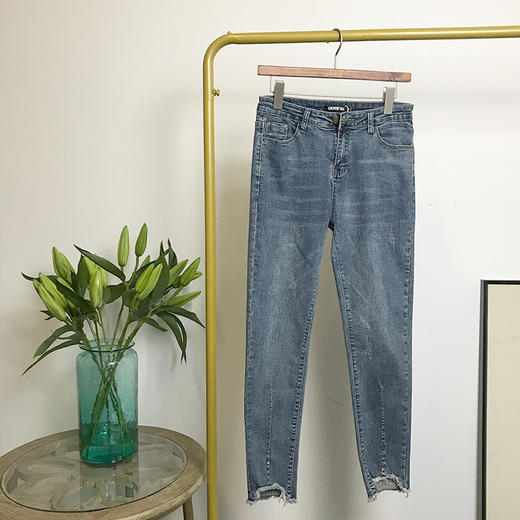 女装小脚铆钉毛边裤