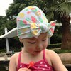 【泳帽】。可爱卡通儿童泳帽 腈纶宝宝蝴蝶结帽子弹力纯色印花宝宝泳帽 商品缩略图1