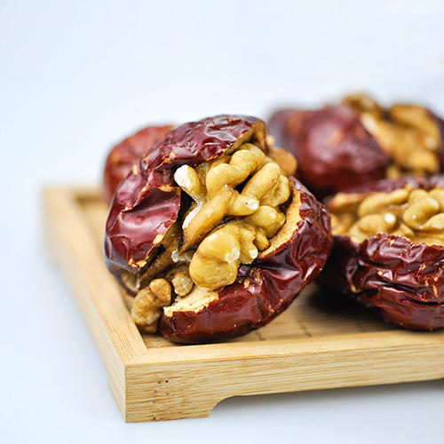 【新货！新疆枣夹核桃】新疆大枣、核桃的完美结合，还夹杂着些许酸甜葡萄干，甜而不腻，营养加倍，健康加倍。净含量500克/袋，江浙沪皖顺丰包邮~ 商品图1
