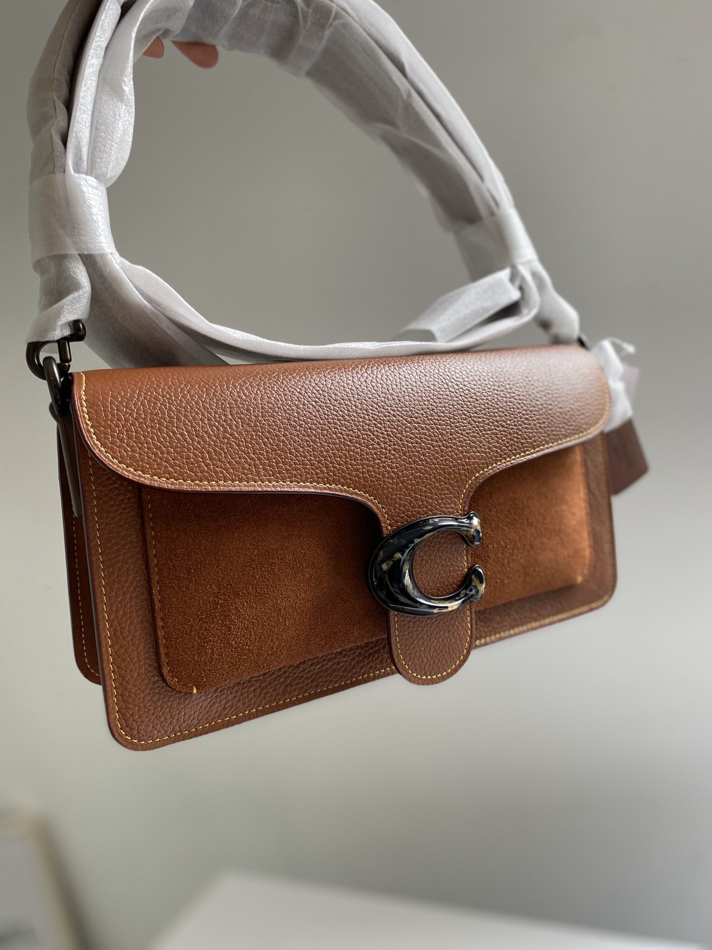 coachtabby焦糖色酒神包