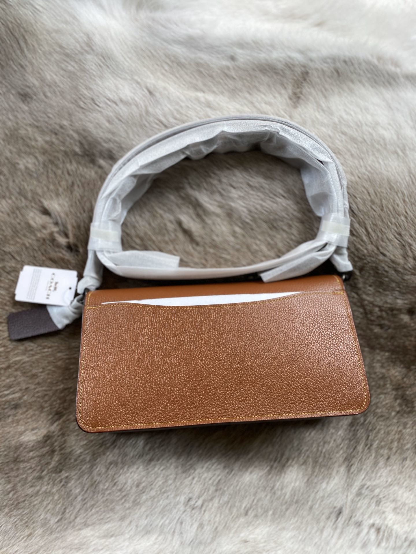 coachtabby焦糖色酒神包