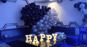 个性黑灰色系生日现场布置