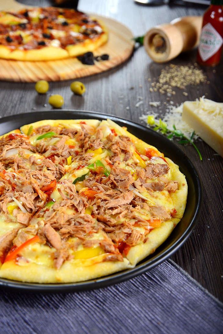 超有料的金枪鱼披萨,不得不受吃货们的青睐,远远就能闻得到的香味,口