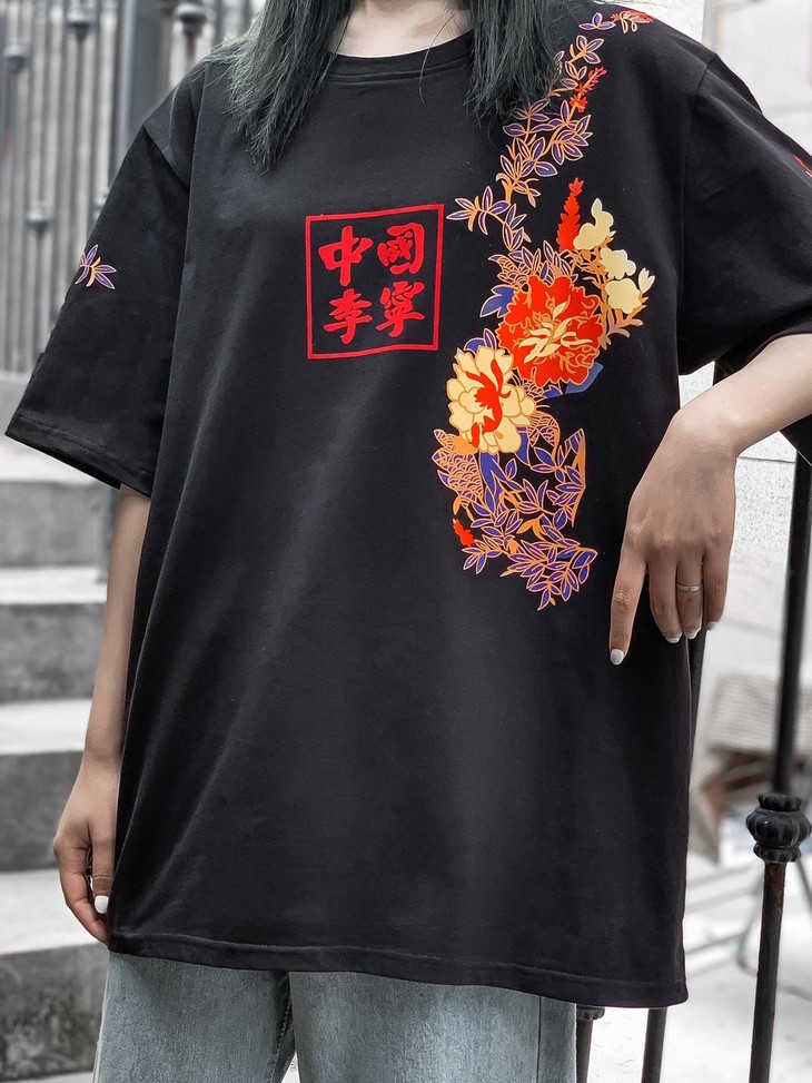 点此购买李宁男女夏季中国风圆领t恤莲144339