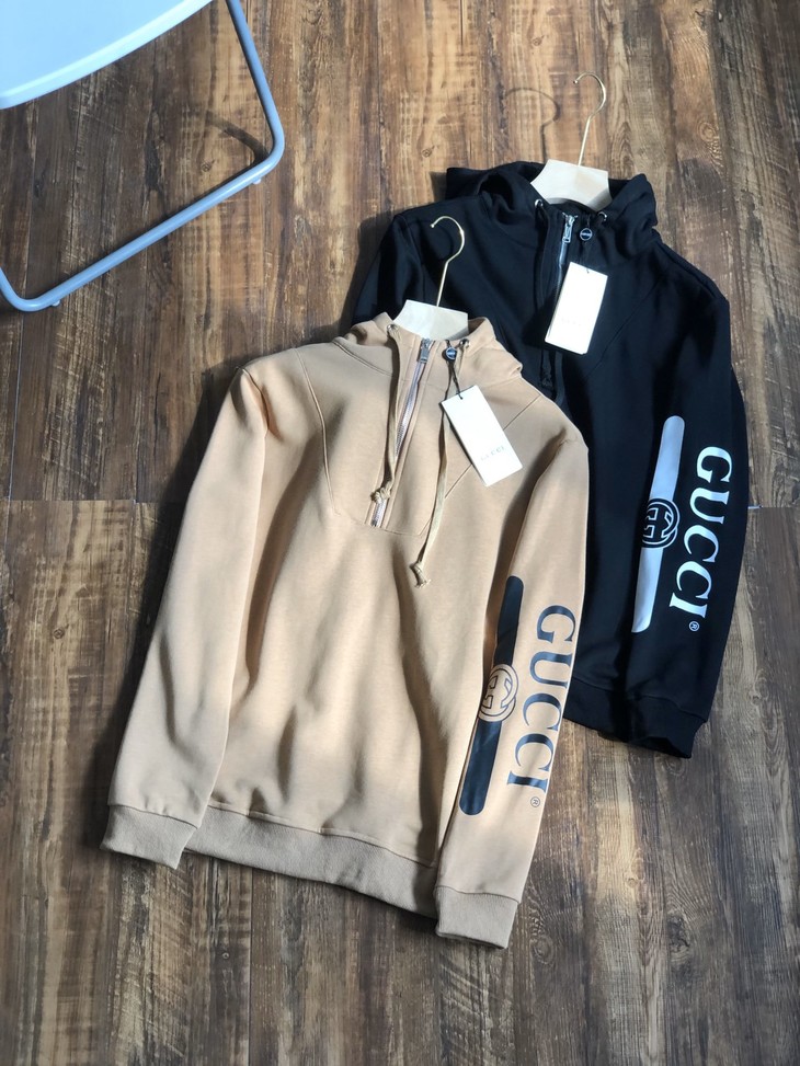 点此购买gucci男女半拉链连帽卫衣摩登156658