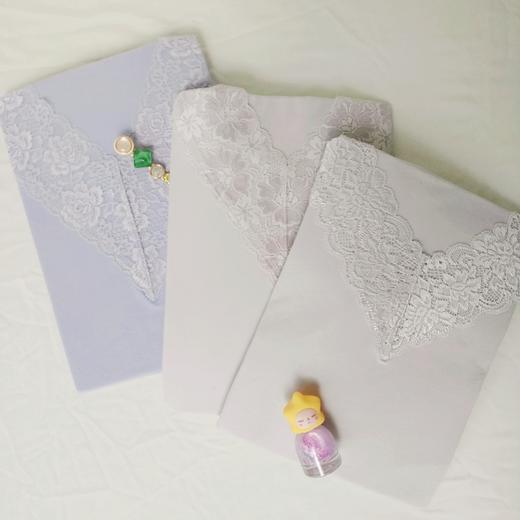 T023A女生蕾丝V领套装 商品图1