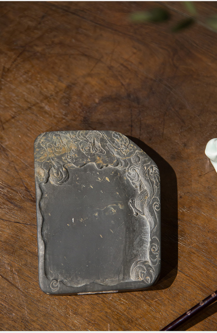 清代双龙戏珠暗细罗纹金星歙砚