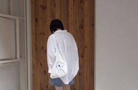 蓝色人物刺绣购物袋