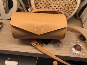 圆形磁扣植鞣杏包