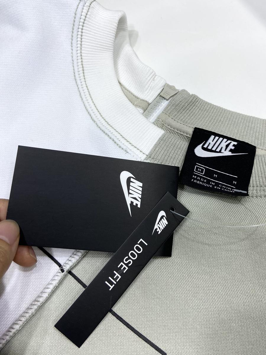 点此购买 耐克男女款拼接撞色拉链卫衣 kp 174478