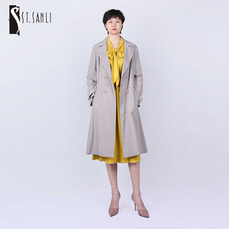 圣三利女装 新品优雅轻薄款收腰散摆纯色风衣SL2031117