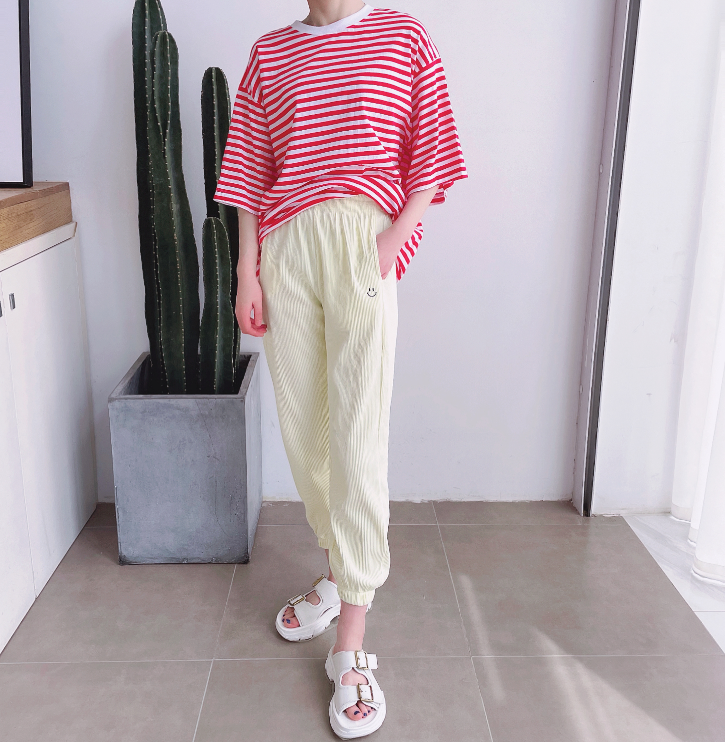 笑脸束脚休闲卫裤