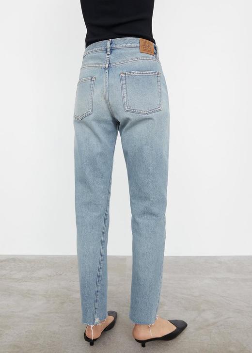 TOTEME 浅蓝色破洞斜裤线牛仔裤 商品图1