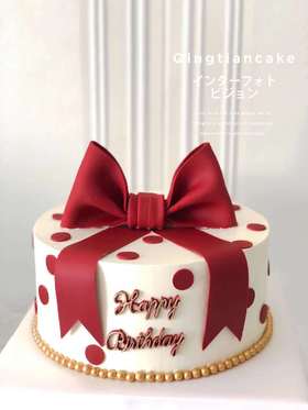 红色蝴蝶结蛋糕（务必提前12小时下单，金色糖珠全部换成白色糖珠）