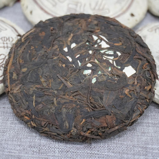 2003年易昌号小饼普洱茶生茶  高等级易武野生大树料 昌泰号经典普洱茶生茶 标价为单片价格一片100克 商品图7