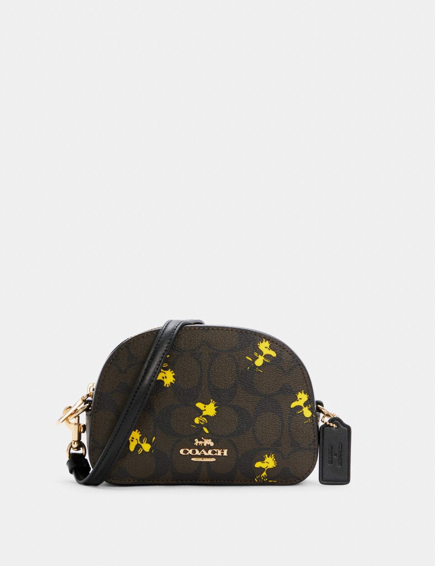 21限量版coachx史努比联名款miniserena馒头包