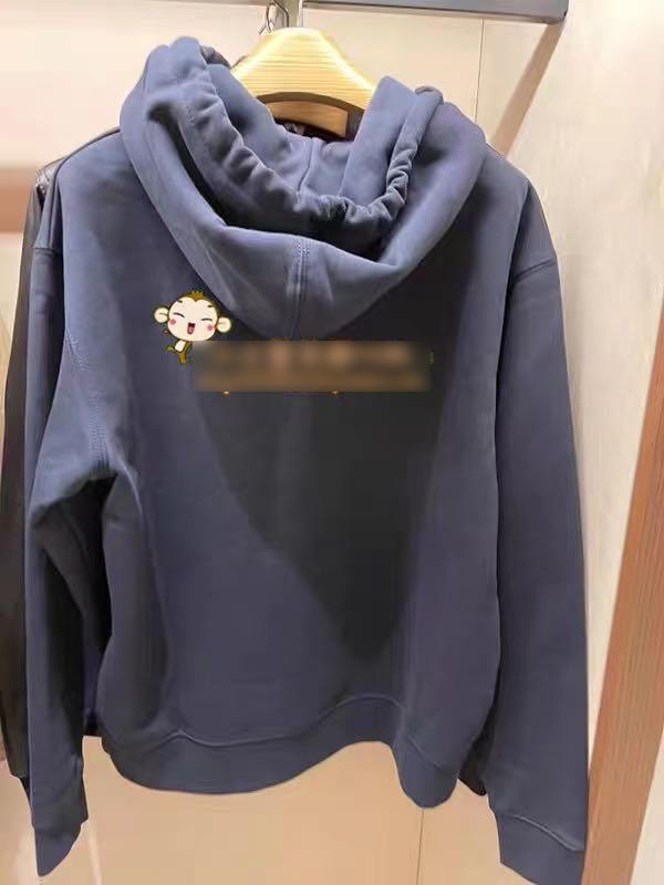 点此购买 蔻驰女款加绒贴布连帽卫衣 ll200671