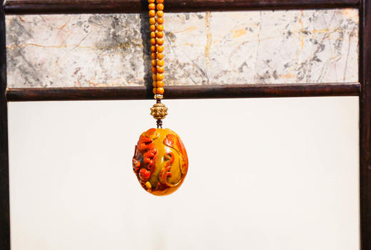 4mm核桃核战国红带天眼手把件 商品图1