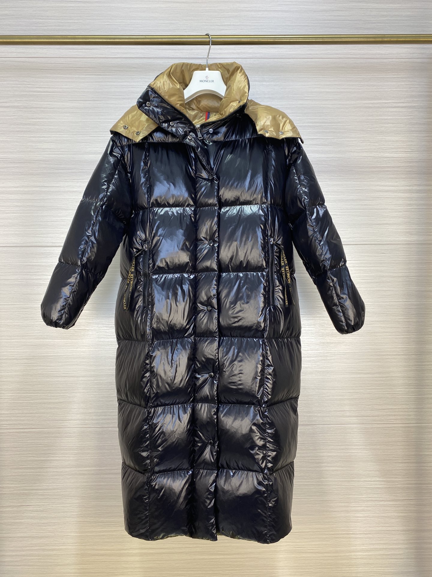 点此购买 蒙口女款连帽加长款羽绒服 hh204029