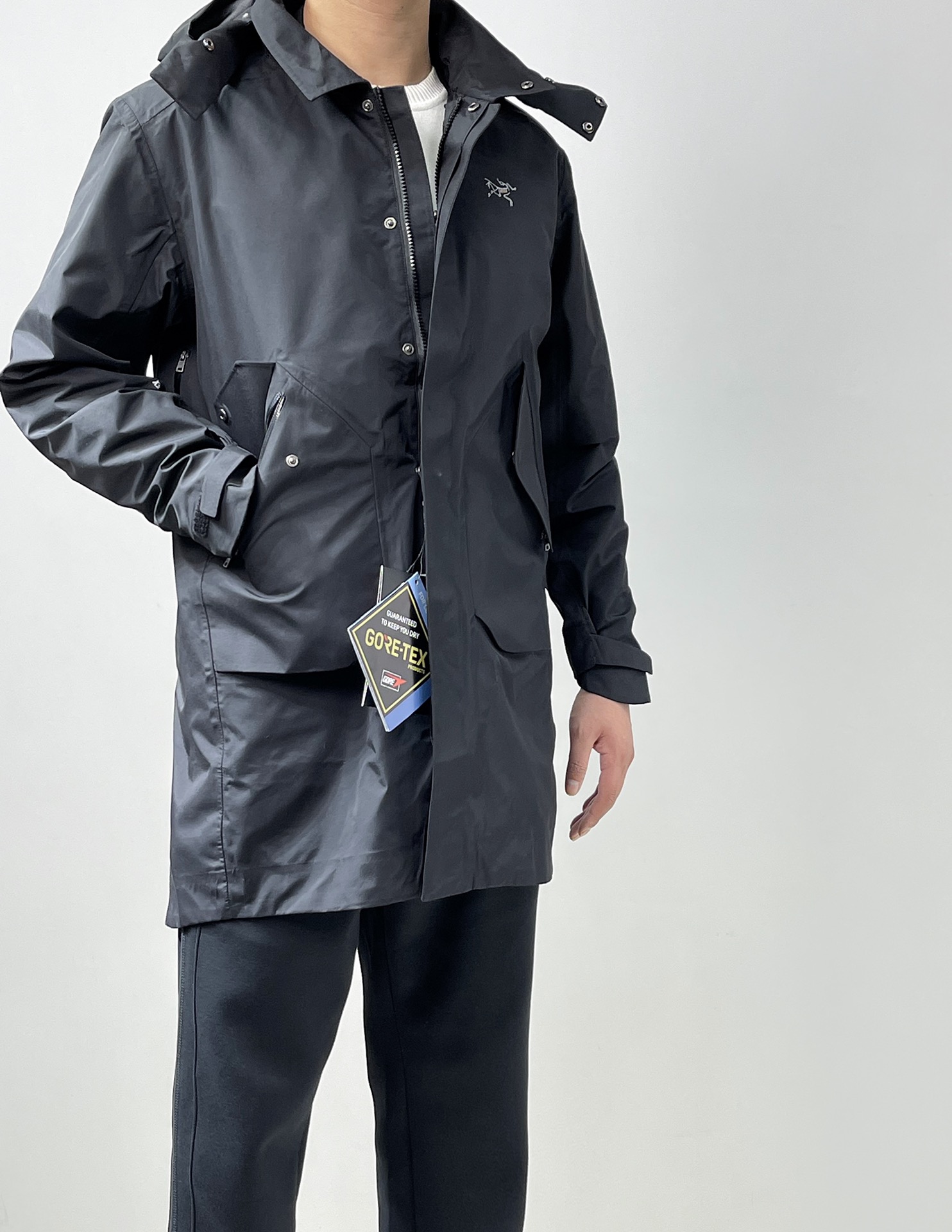 点此购买 始祖鸟男款三合一中长款连帽羽绒服 sp205047