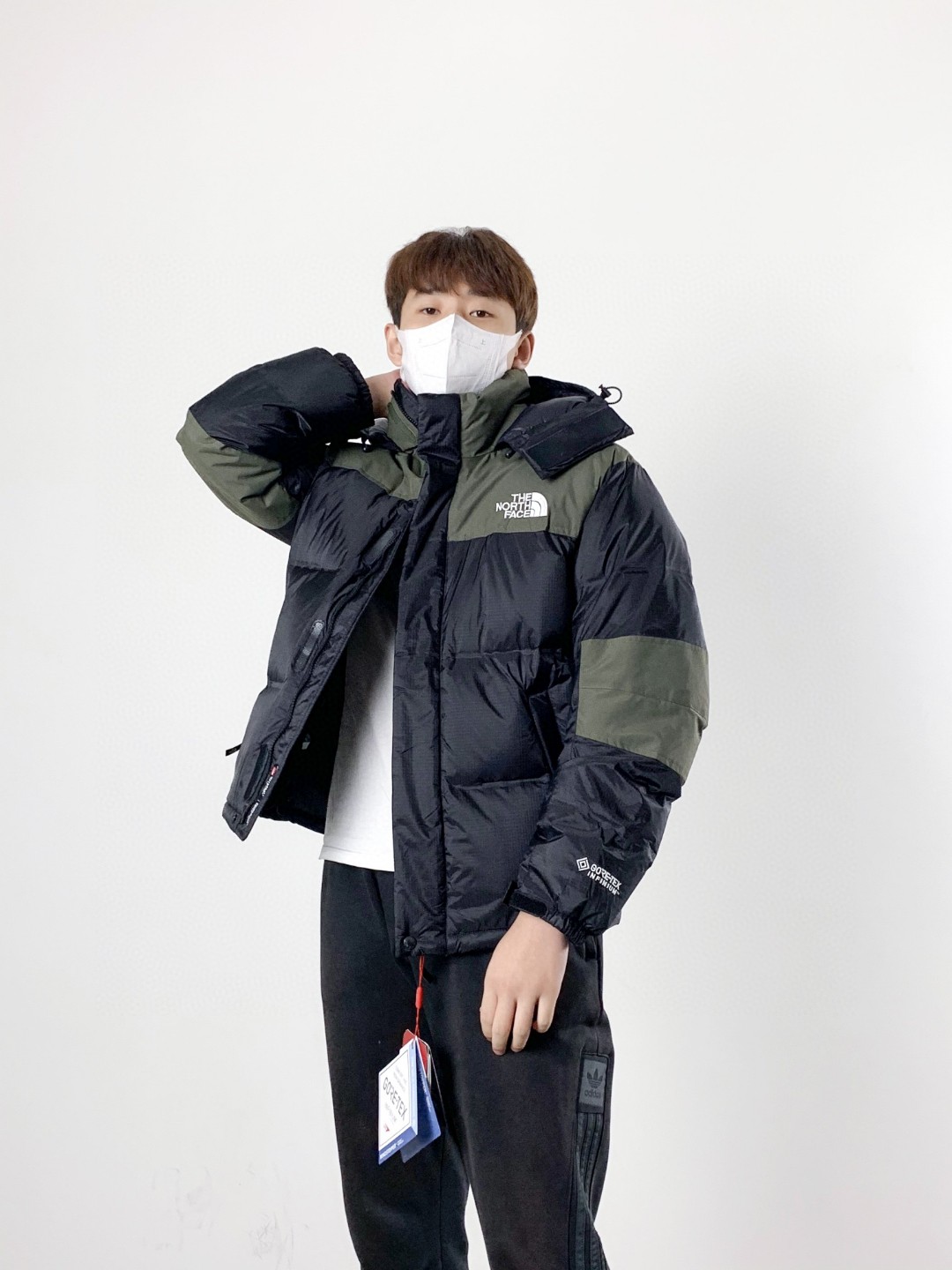 点此购买 北面男款鹅绒97巅峰连帽羽绒服 bs206698