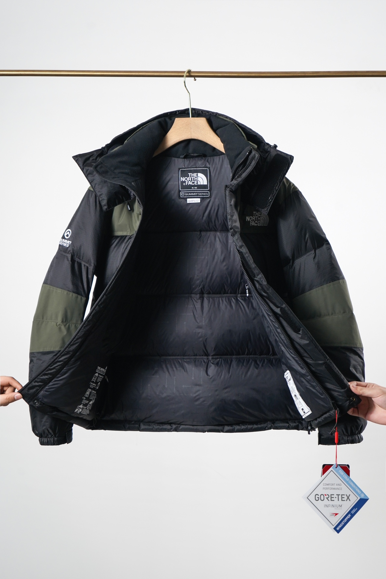 点此购买 北面男款鹅绒97巅峰连帽羽绒服 bs206698