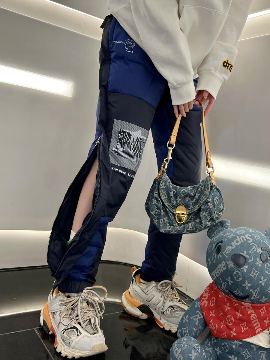 点此购买 北面联名男女侧缝拉链羽绒裤 ll 208267