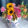 【一路生花】向日葵2 笑颜康6 棉花橙小雏菊3 橙色水仙百合3 玫红麦秆菊2（王嘻嘻设计） 商品缩略图1