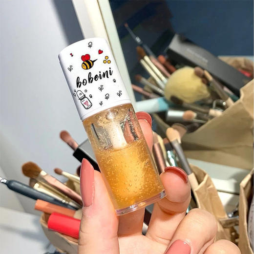 【限时特惠 买一送一！】蜜桃水晶蜂蜜唇釉  牛奶味孕妇男女通用款护理唇油滋润保湿润唇膏 商品图2