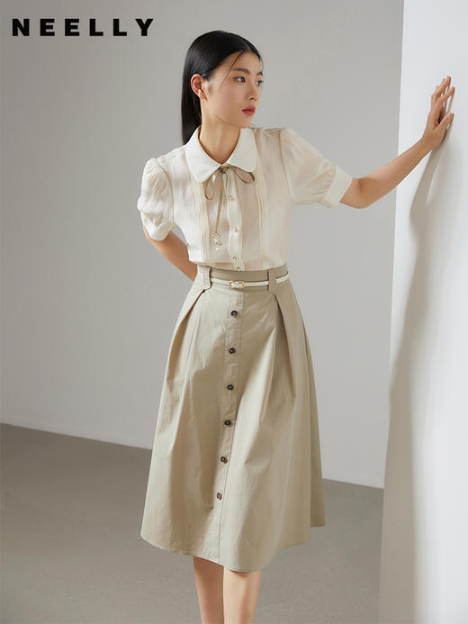 NEELLY纳俪夏季半身裙女立体打褶显瘦A字裙单排扣装饰中长款百搭 商品图0