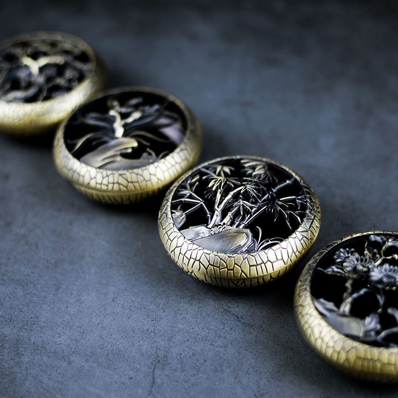 梅兰竹菊合金盘香炉