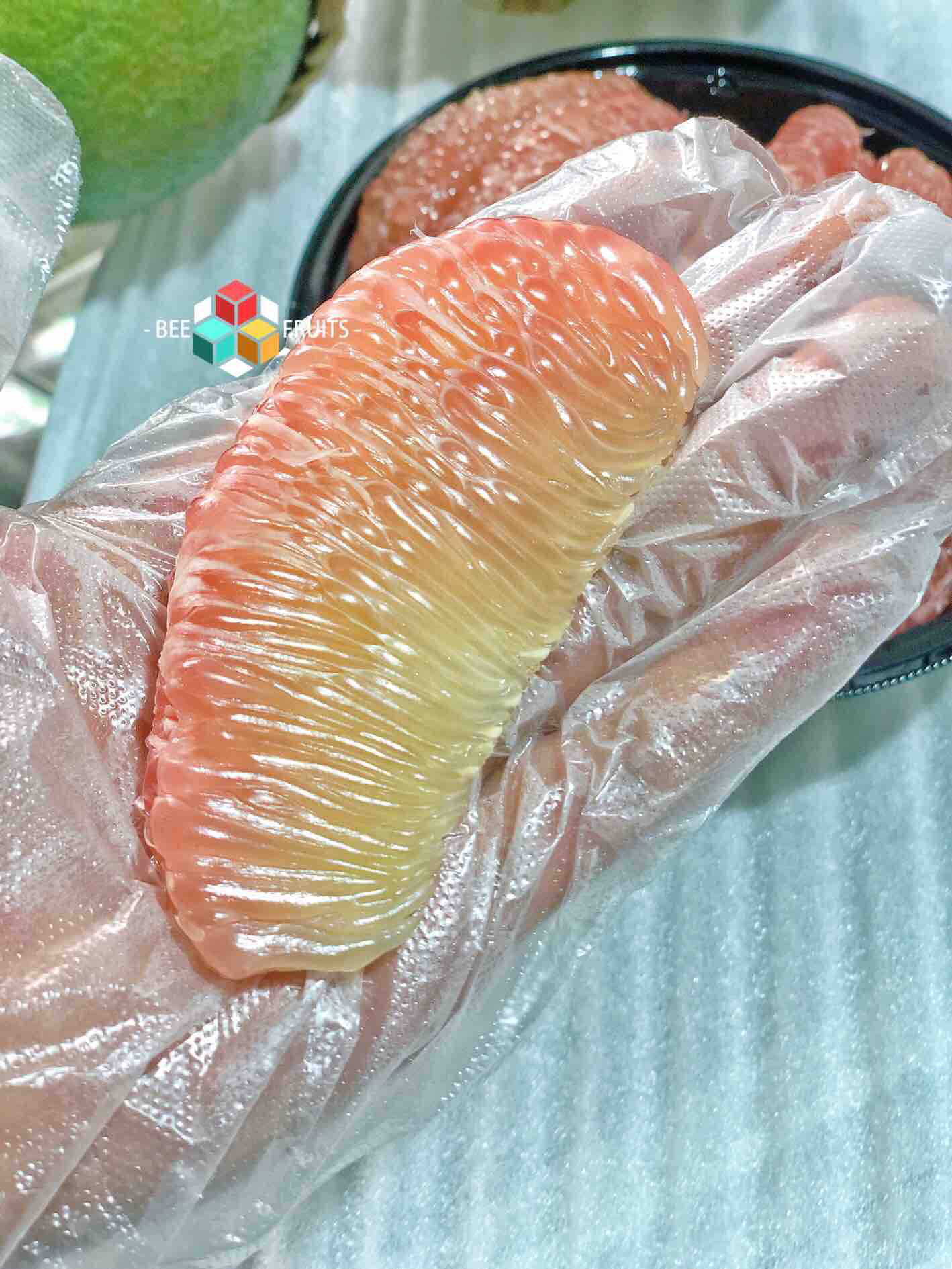 翡翠柚郑师傅泰国红心柚翡翠柚青皮红肉味道甜是翡翠青柚的特点