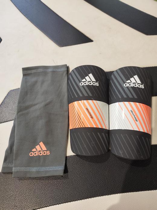 小李子:专柜正品Adidas Nitrocharge狂战士足球护腿板M38723 商品图0