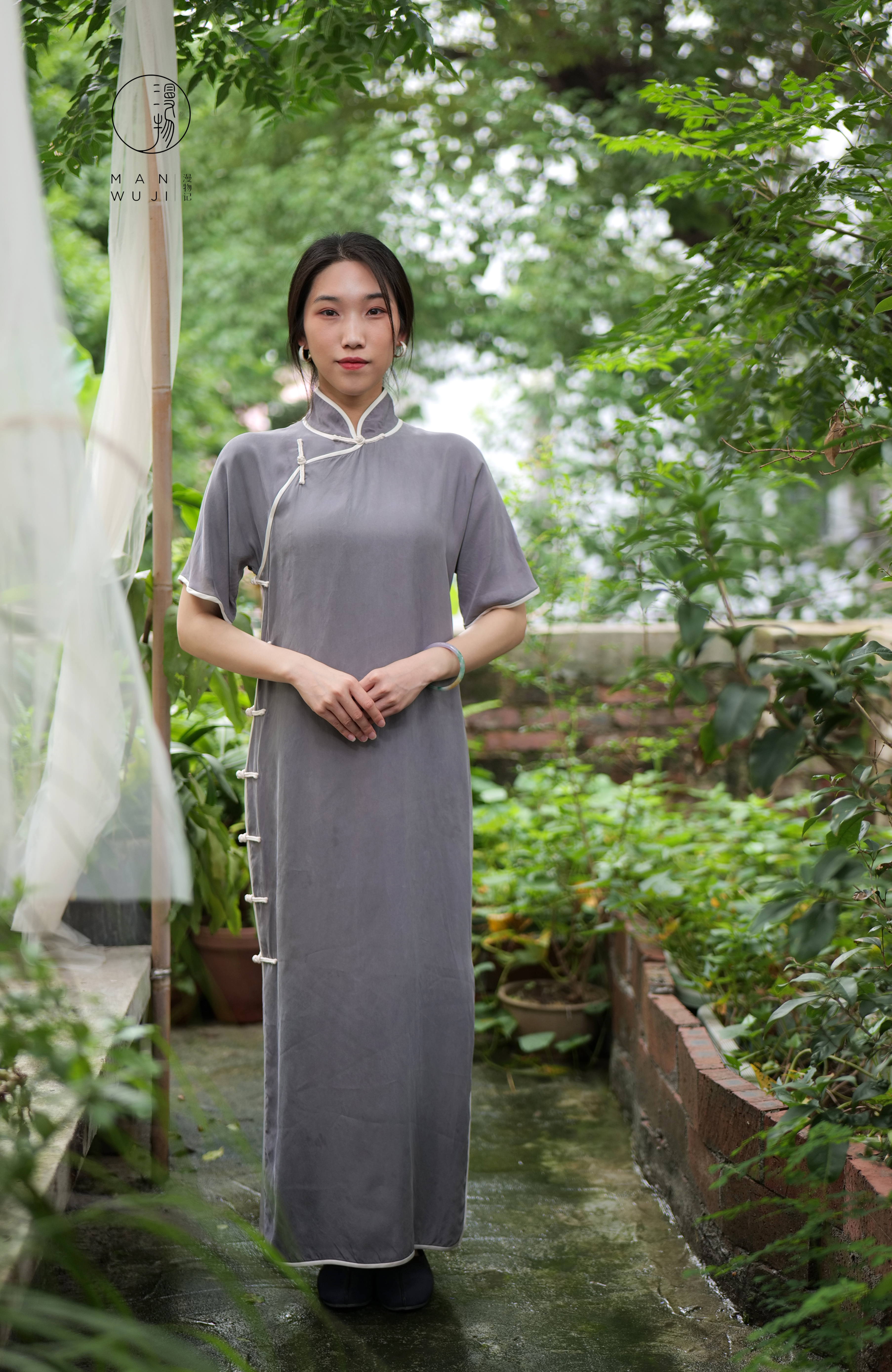 铜氨丝包边四分连袖旗袍