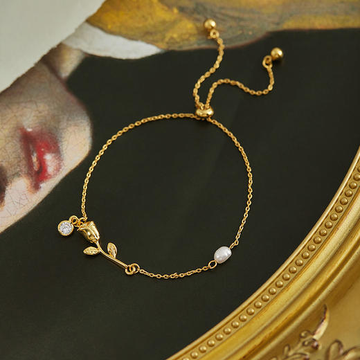 【包邮】Oflye潮流饰品 天然珍珠抽拉式手链女金属玫瑰吊坠锆石镶嵌气质饰品 商品图1