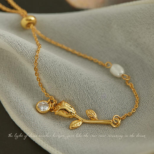 【包邮】Oflye潮流饰品 天然珍珠抽拉式手链女金属玫瑰吊坠锆石镶嵌气质饰品 商品图3