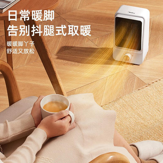 美的（Midea） 暖风机取暖器家用办公室桌面电暖气便携式电暖器速热小型摇头电热风机扇暖手暖脚神器 HFW15MT 商品图5