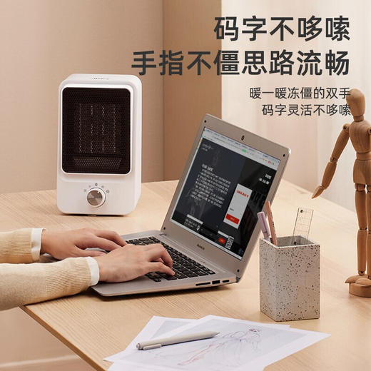 美的（Midea） 暖风机取暖器家用办公室桌面电暖气便携式电暖器速热小型摇头电热风机扇暖手暖脚神器 HFW15MT 商品图4