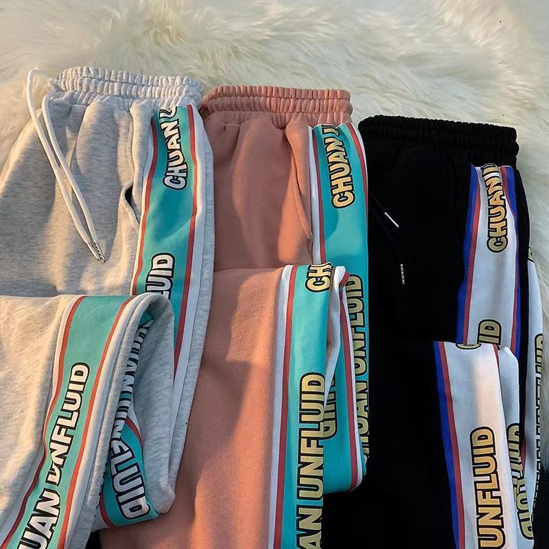 迎418/F1-2/ KG3652 侧面字母拼色休闲裤